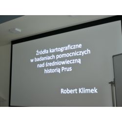 Plansza na wykładzie Roberta Klimka