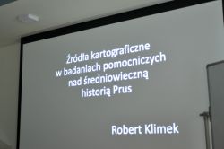 Plansza na wykładzie Roberta Klimka